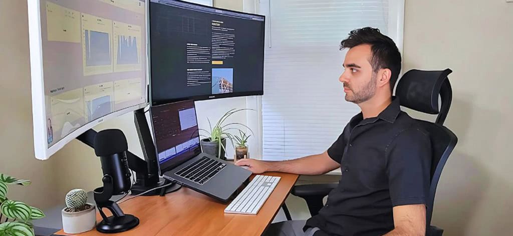 Man working at desk.
